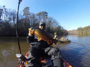Anglers Sport Center pro staffer Alex Perez shows of his nice Carp.